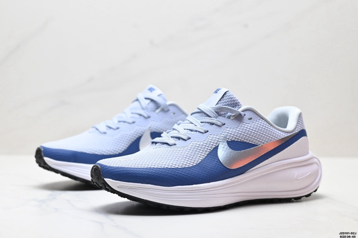 Nike Revolution 8 Running Shoes, in Light Blue and Navy - product image from the listing.