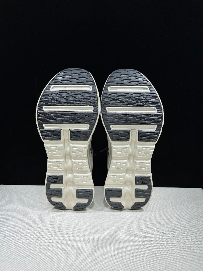 On Cloudtilt Sneakers, in Light Gray and Black - product image from the listing.