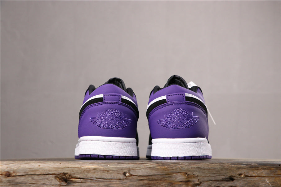 Air Jordan 1 Low Sneakers in White Black Orange Purple 553558-125 - product image from the listing.