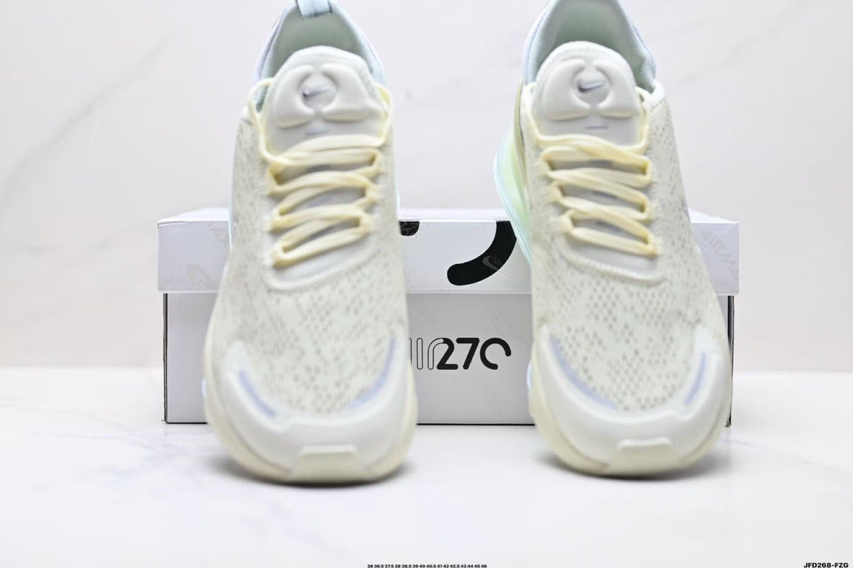 Light Green and White Nike Air Zoom Sneakers - product image from the listing.