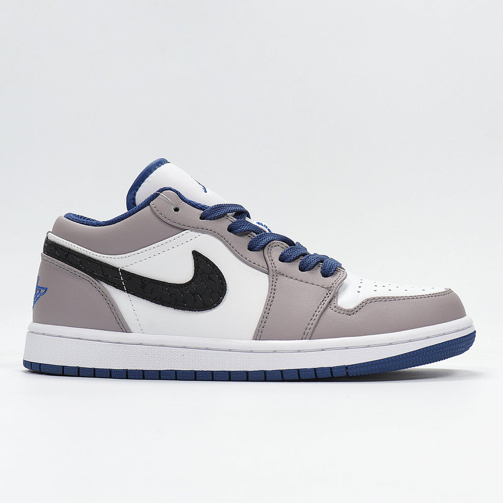 Jordan 1 Low Sneakers in White Grey Blue 553558-103 - product image from the listing.