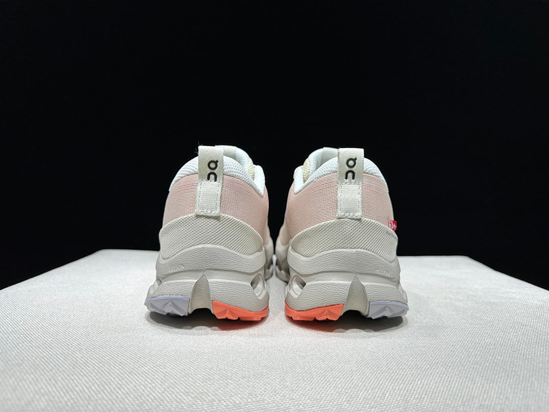 On Cloudsurfer Trail 2 Trail Running Shoes, in Ivory and Coral - product image from the listing.