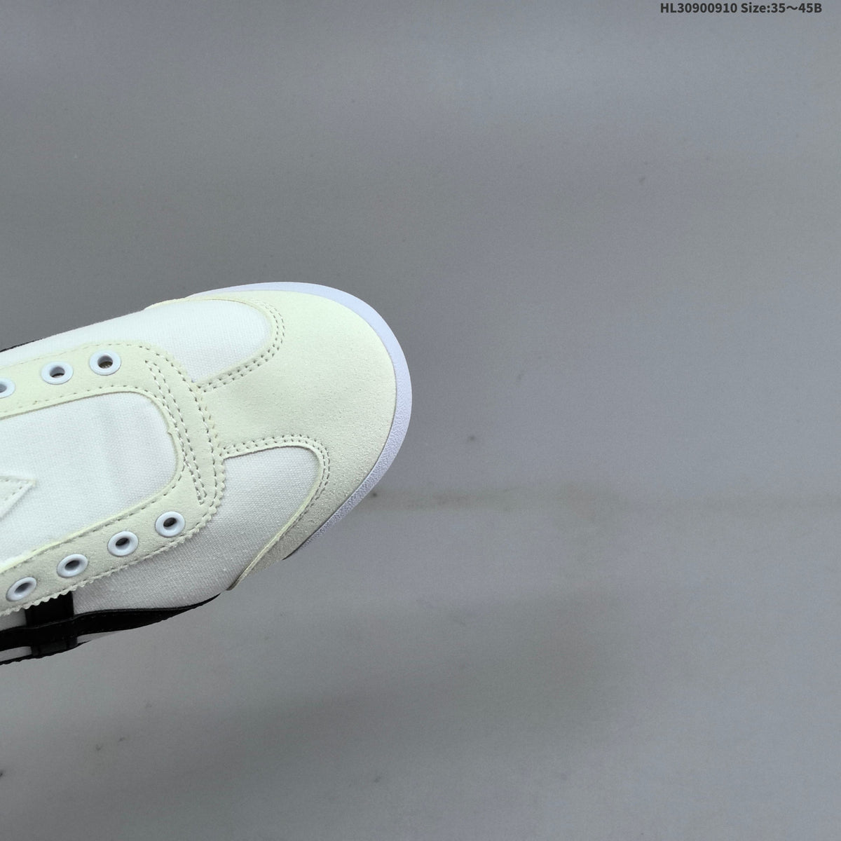 Onitsuka Tiger Mexico 66 Slip-On Sneakers in White Black D342Q - product image from the listing.