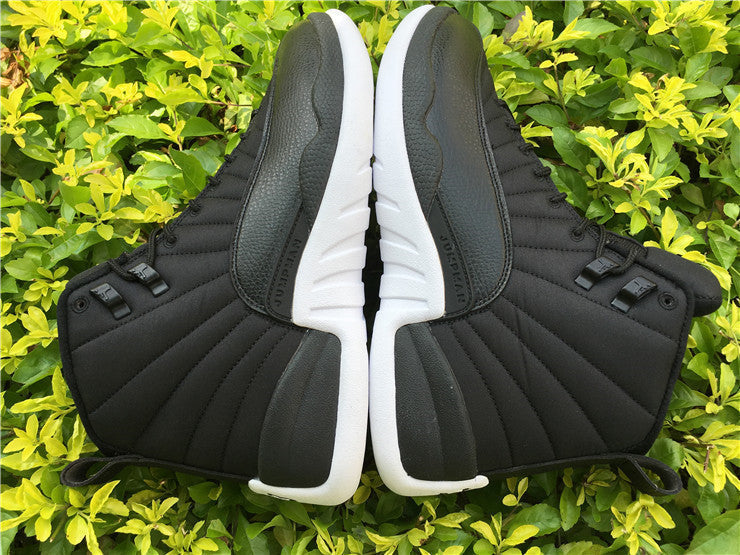 Air Jordan 12 Black Nylon High-Top Sneakers - product image from the listing.