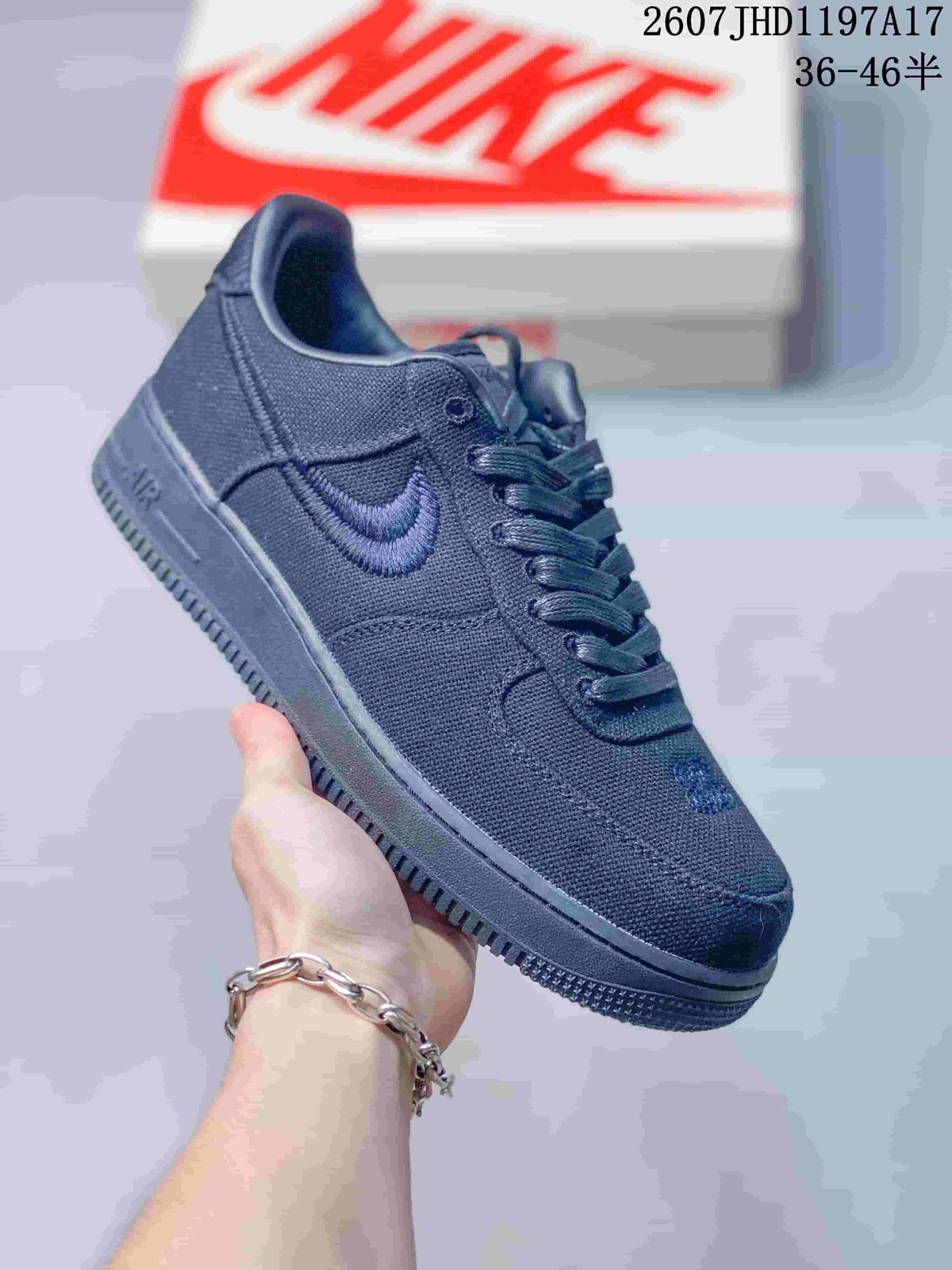 Black and Cream Nike Air Force 1 '07 x Stussy Sneakers - product image from the listing.