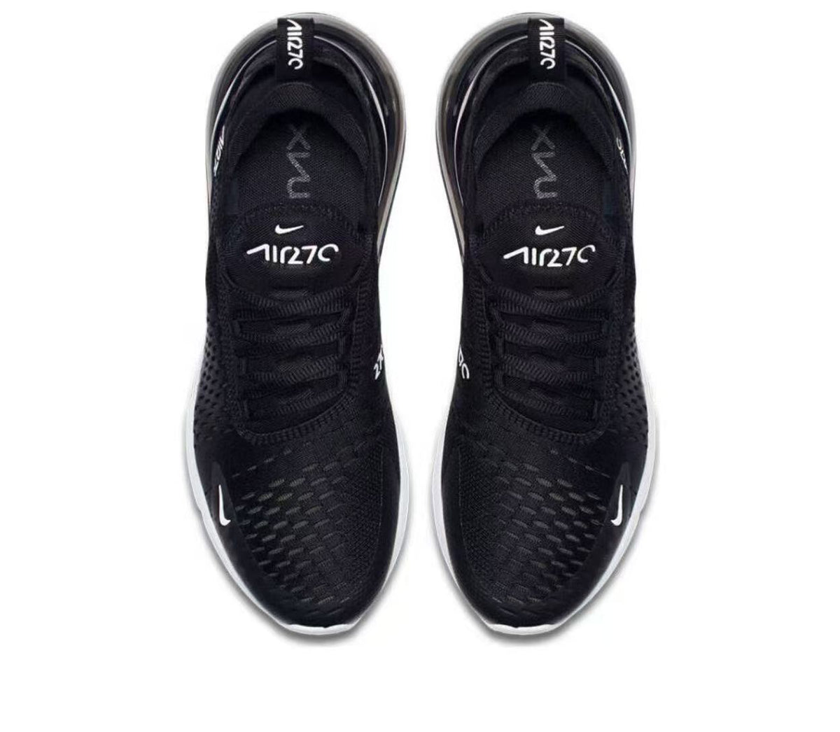 Nike Air Zoom Sneaker in Black and White - product image from the listing.