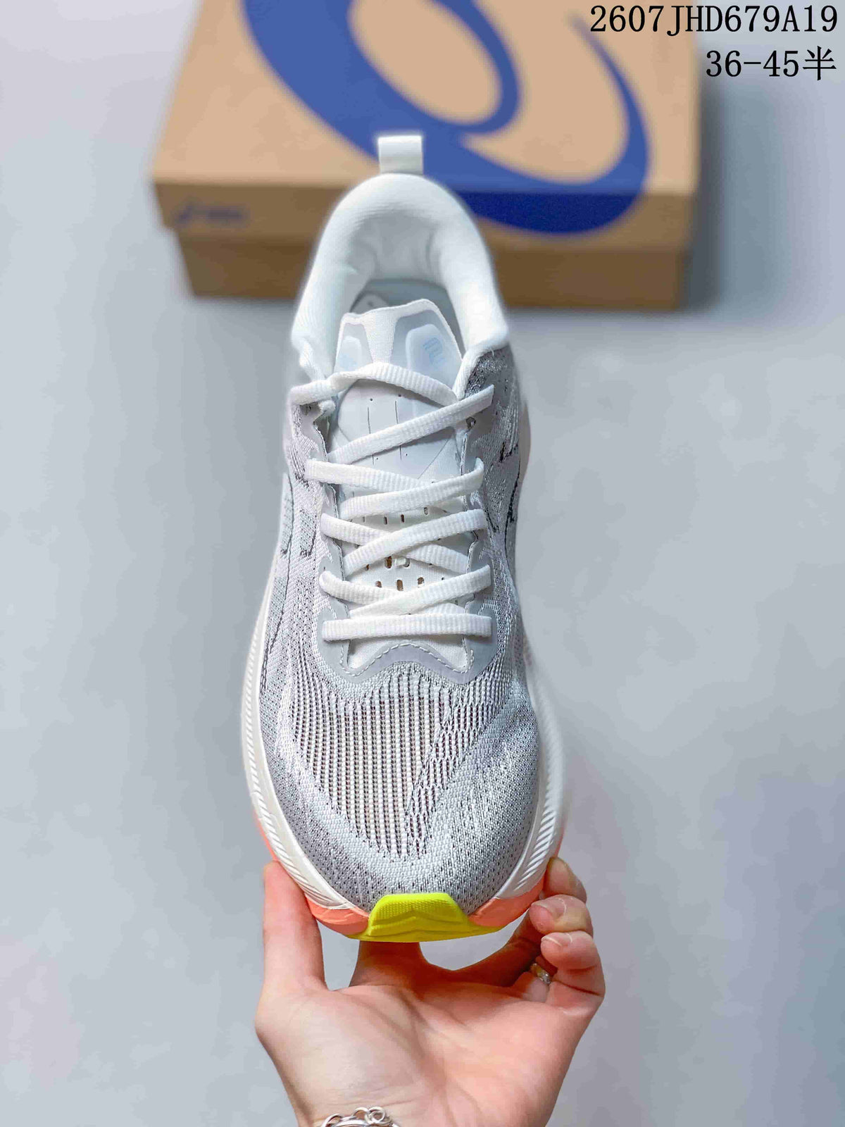 ASICS Superblast 2 Paris Running Shoes in Gray White Coral - product image from the listing.