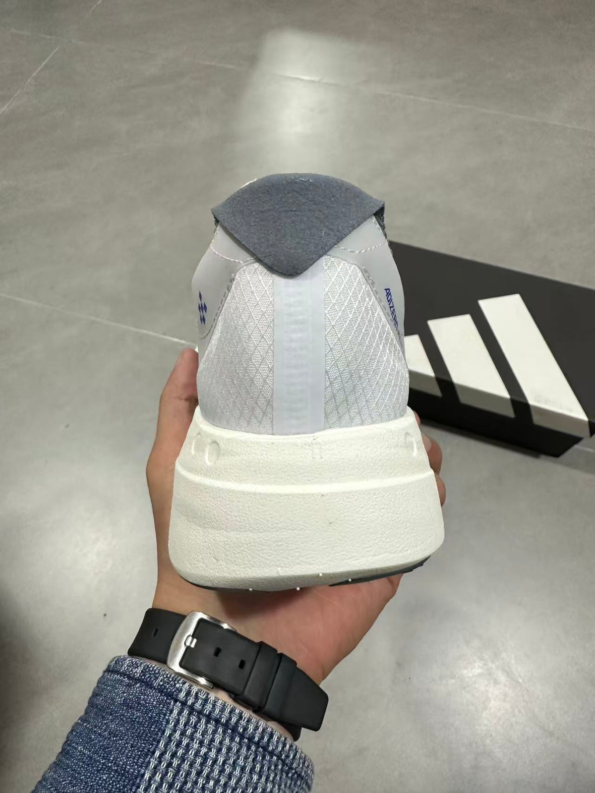 adidas Lightstrike Pro Running Shoes in White Blue - product image from the listing.