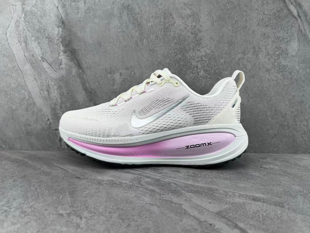 Nike ZoomX White and Lavender Sneakers for Running - product image from the listing.