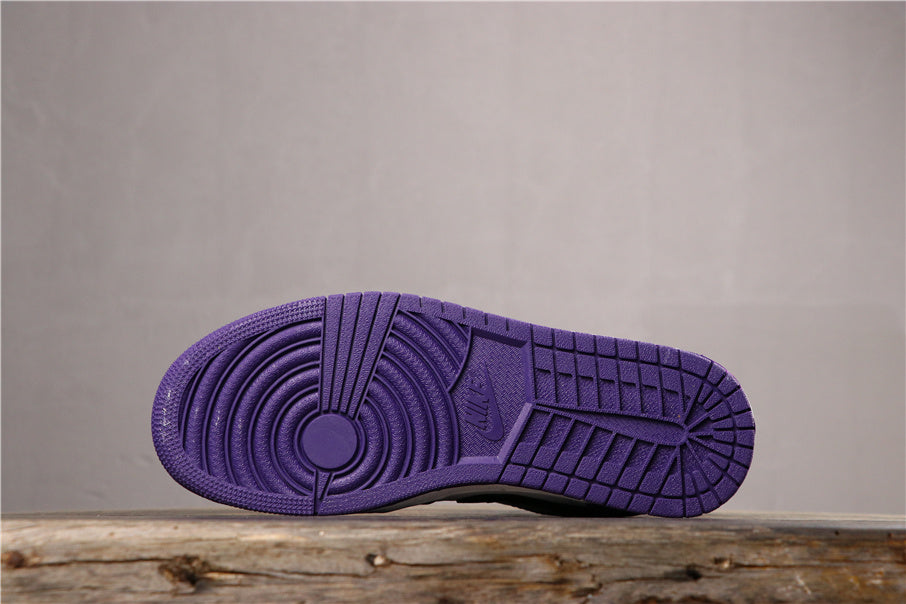 Air Jordan 1 Low Sneakers in White Black Orange Purple 553558-125 - product image from the listing.