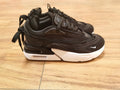 Nike Air Max Scorpion Sneakers in Black and White - product image from the listing.