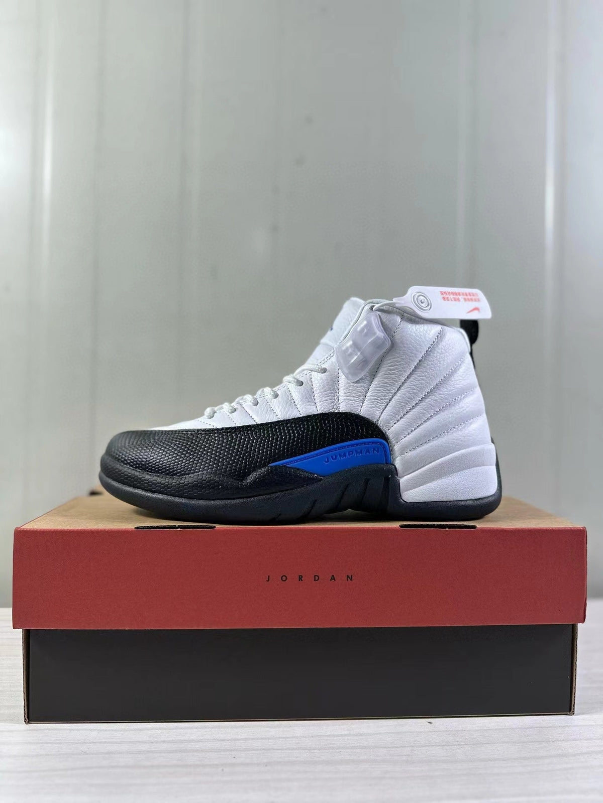 Air Jordan 12 Retro White Black Game in Royal CT8013-140 - product image from the listing.