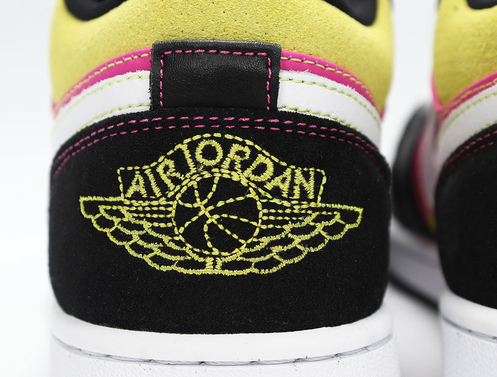 Jordan 1 Low Sneakers in Yellow Pink Black CW5564-001 - product image from the listing.