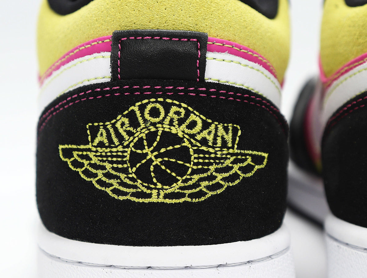 Jordan 1 Low Sneakers in Yellow Pink Black CW5564-001 - product image from the listing.