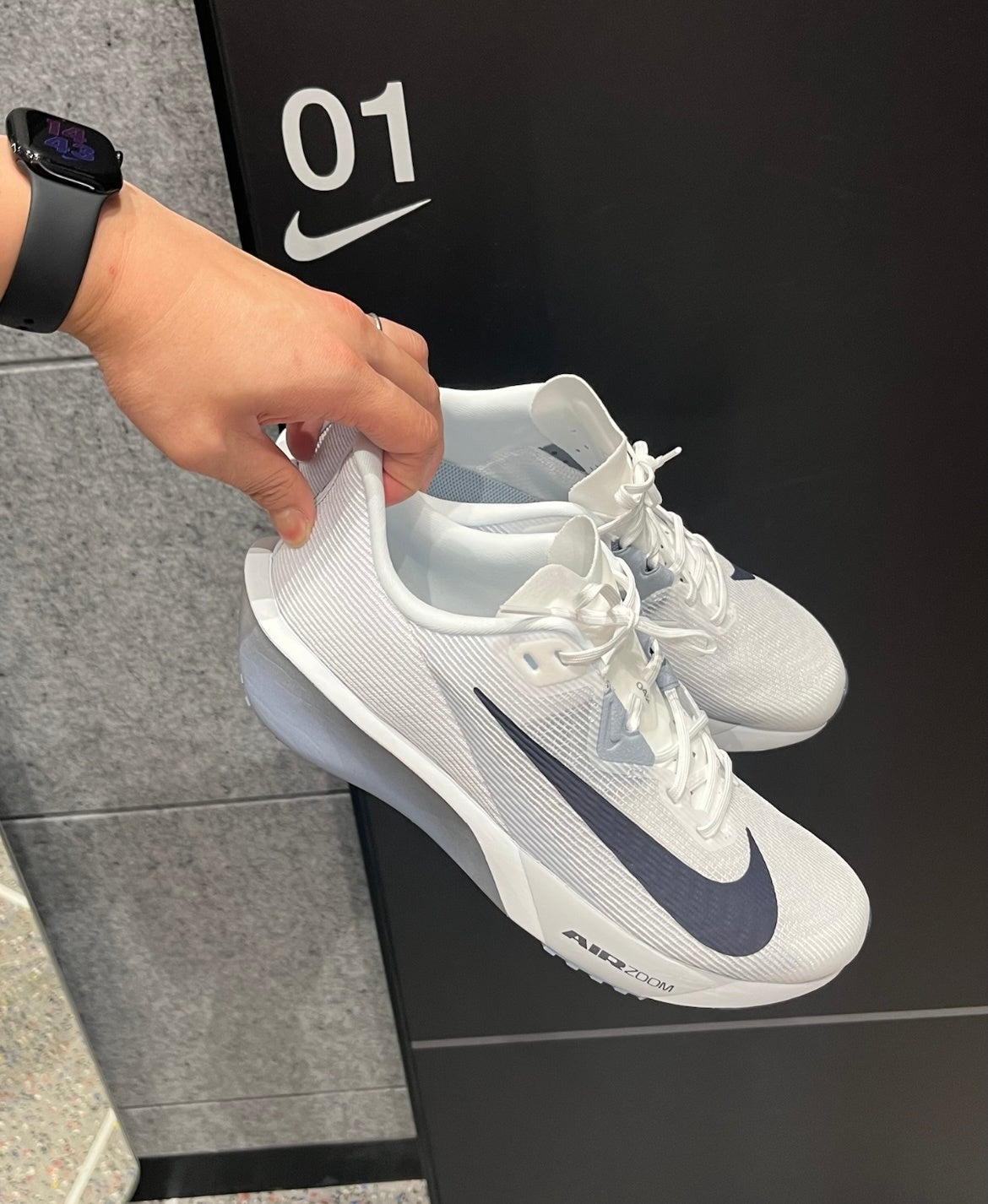 Nike Air Zoom Rival Fly 4 Running Shoes FV6040-102 in Gray White - product image from the listing.