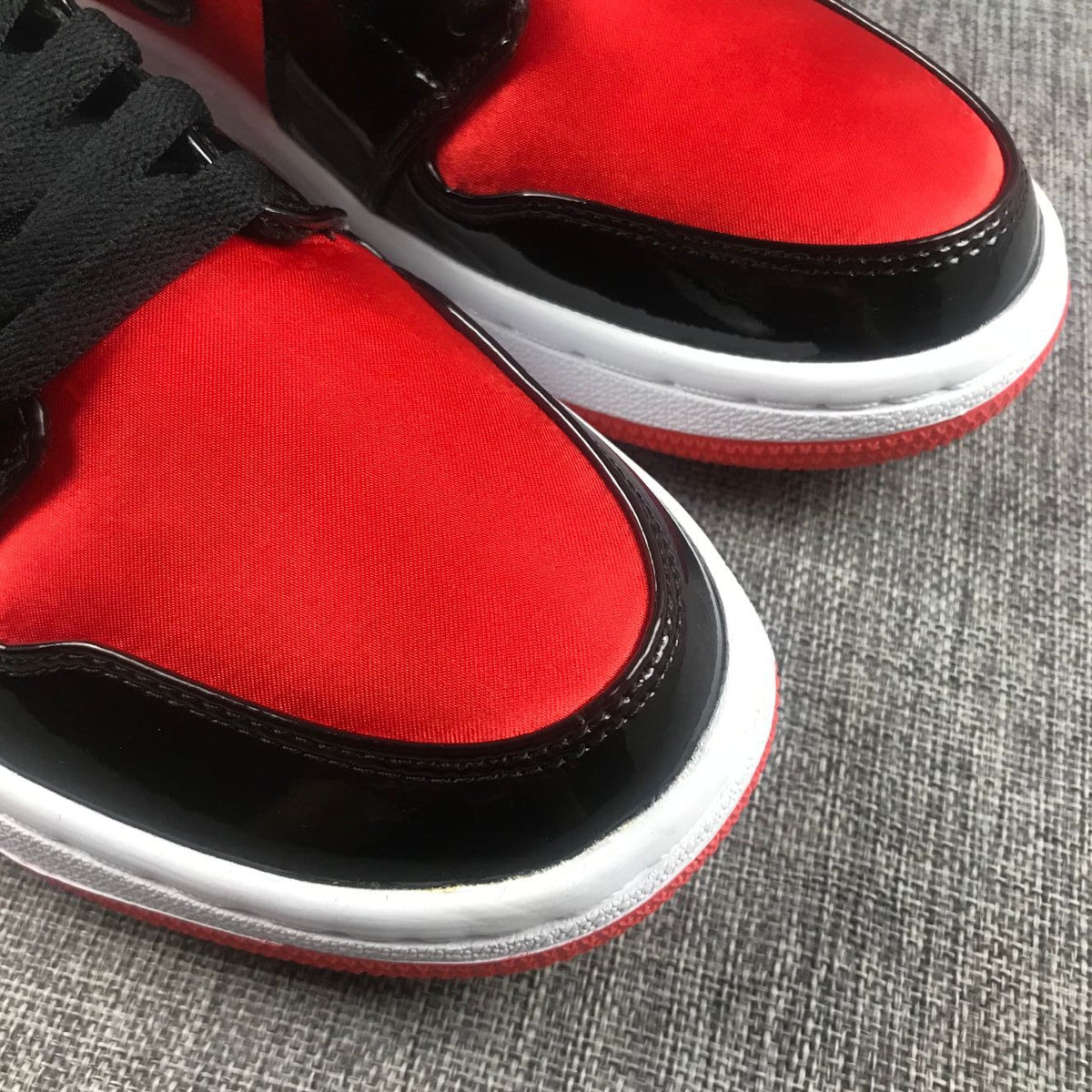 Air Jordan 1 Mid Sneakers in Black Red White BQ6472-600 - product image from the listing.