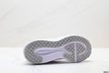 Nike Revolution 8 Running Shoes in White and Light Purple - product image from the listing.