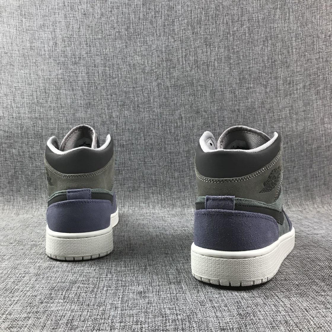 Jordan 1 Mid SE Sneakers in Grey Purple 852842-203 - product image from the listing.