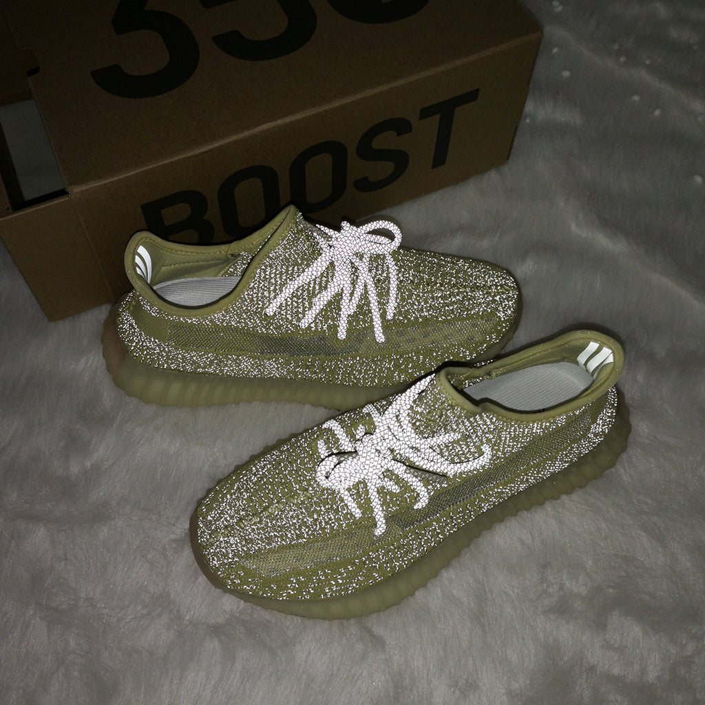 Pale Yellow adidas Yeezy Boost 350 V2 Sneakers - product image from the listing.