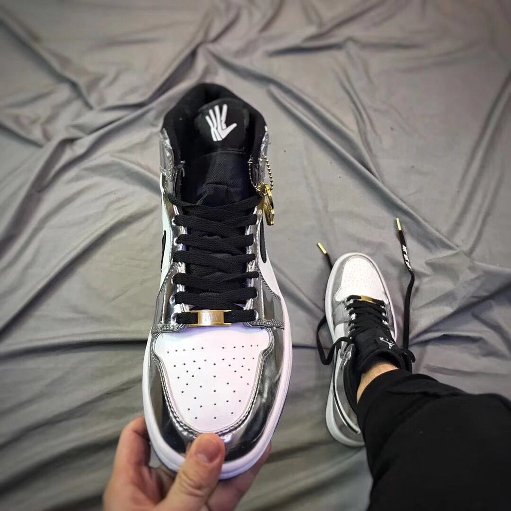 Air Jordan 1 Pass The Torch High-Top Sneakers Silver White - product image from the listing.