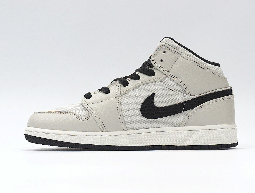 Light Smoke Grey and Black Jordan 1 Retro High OG Sneakers - product image from the listing.