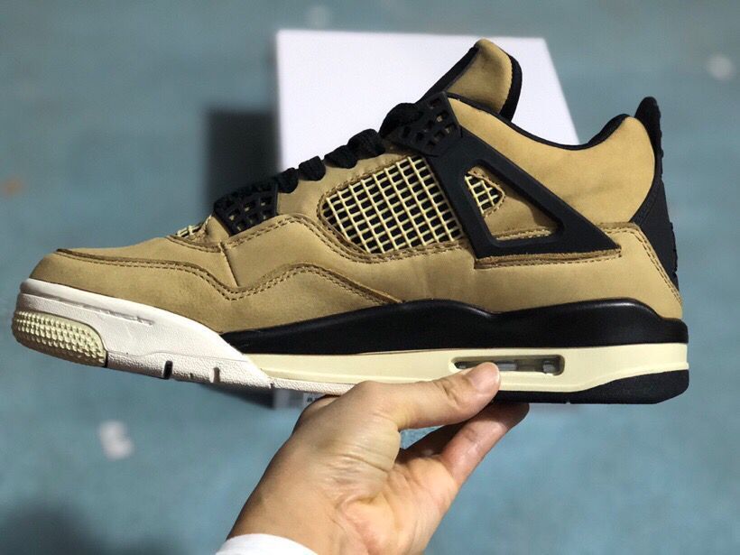 Jordan 4 Retro Sneakers in Tan Black - product image from the listing.