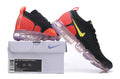 Nike Air VaporMax Flyknit 2 Sneakers in Black and Yellow - product image from the listing.