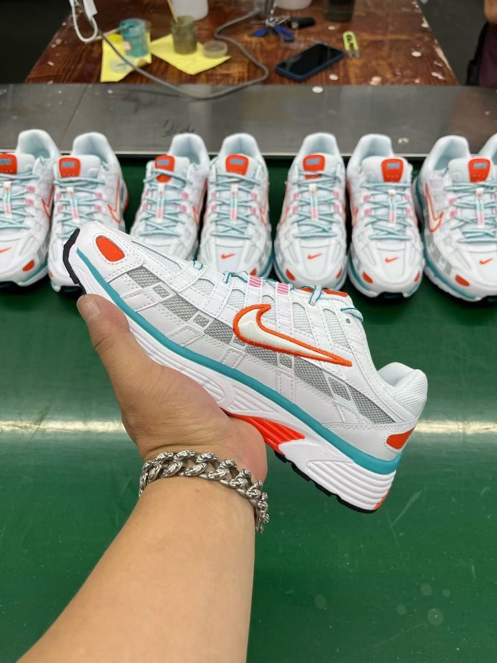 Nike P-6000 Sneakers in White Orange Teal - product image from the listing.