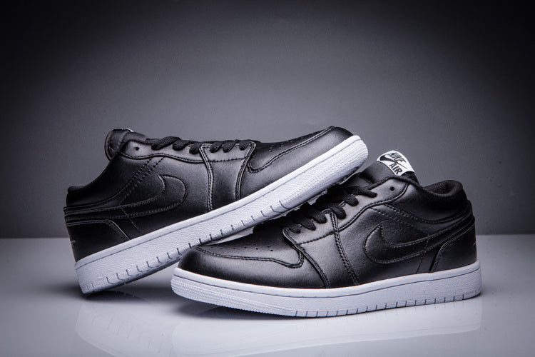 Air Jordan 1 Low Black and White Sneakers - product image from the listing.