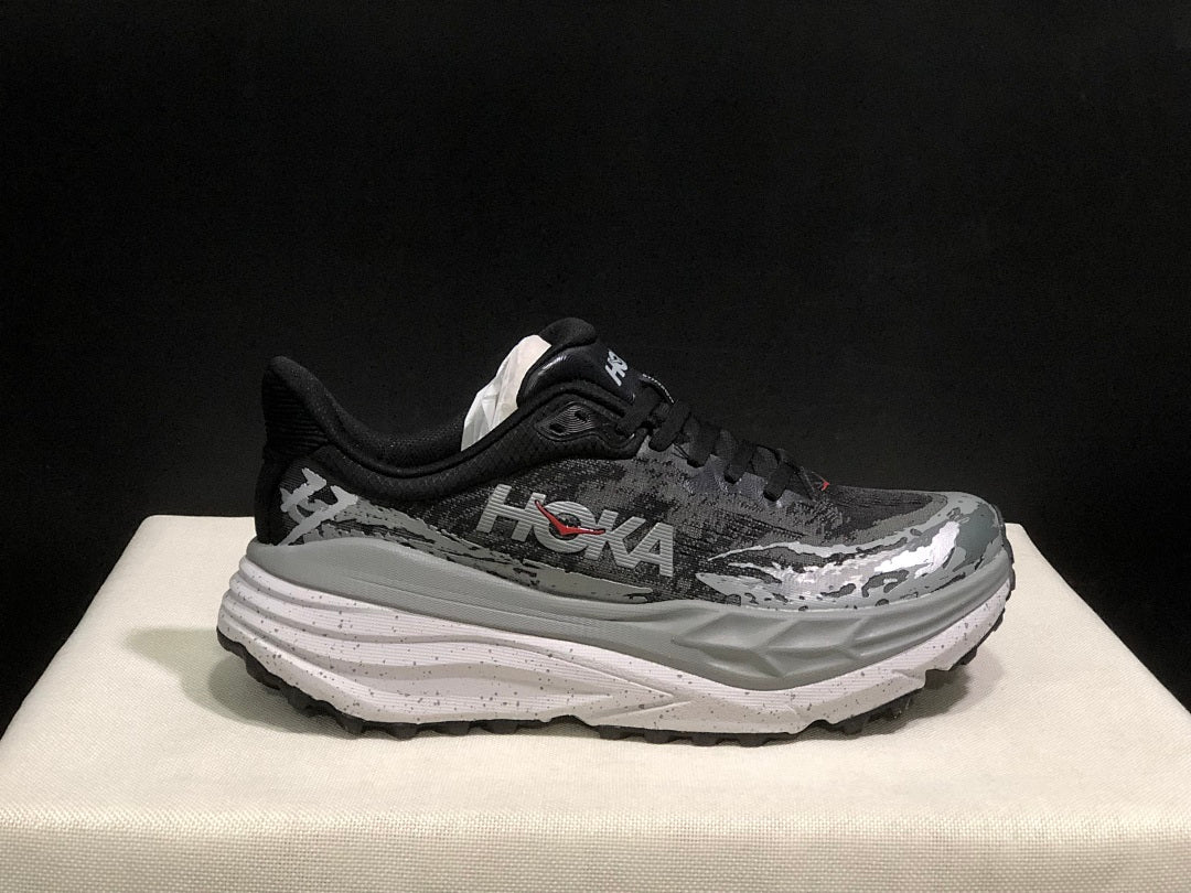 Black and Gray HOKA Stinson 7 Trail Running Shoes - product image from the listing.