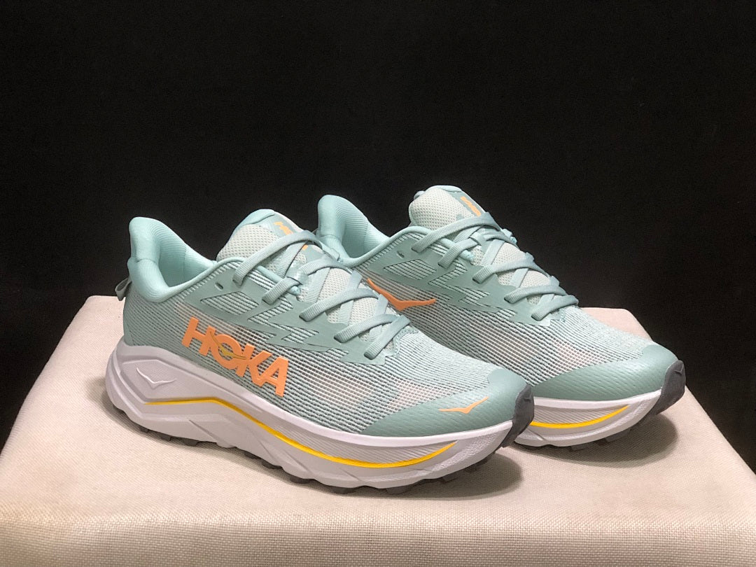 HOKA Challenger 8 Trail Running Shoes, Sage and in Coral - product image from the listing.