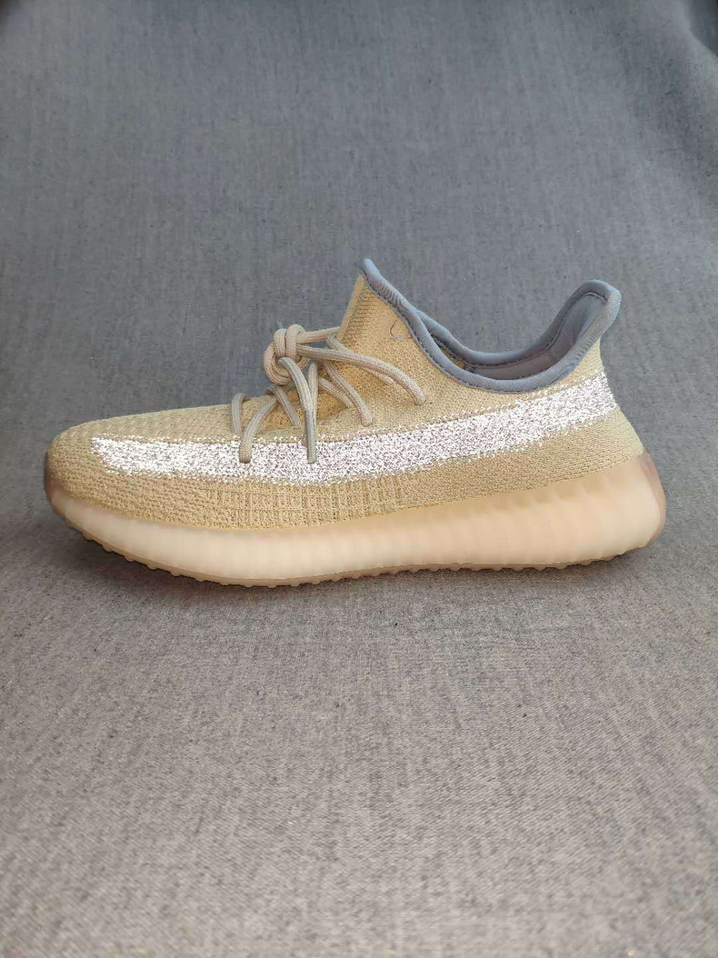 Beige Yeezy Boost 350 V2 Reflective Knit Sneakers - product image from the listing.