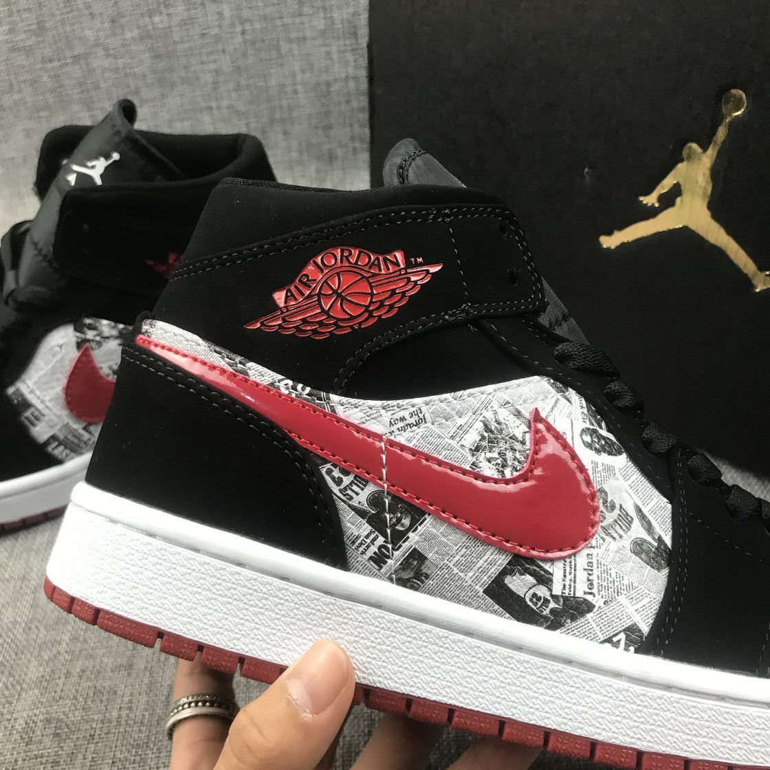 Air Jordan 1 Mid Sneakers in Black Red 852542-061 - product image from the listing.
