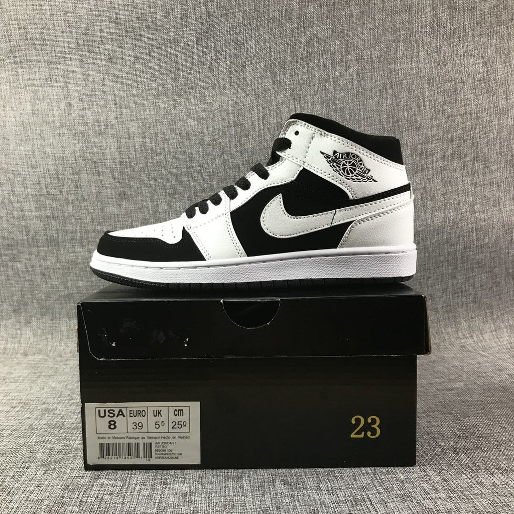 Air Jordan 1 Mid Black White Sneakers 554724-113 - product image from the listing.