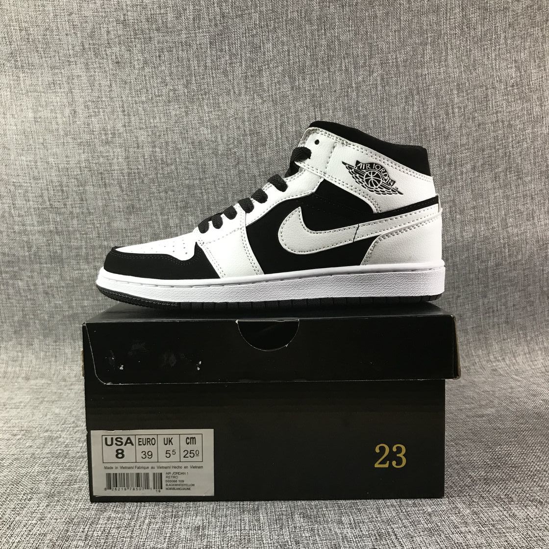 Air Jordan 1 Mid Black White Sneakers 554724-113 - product image from the listing.