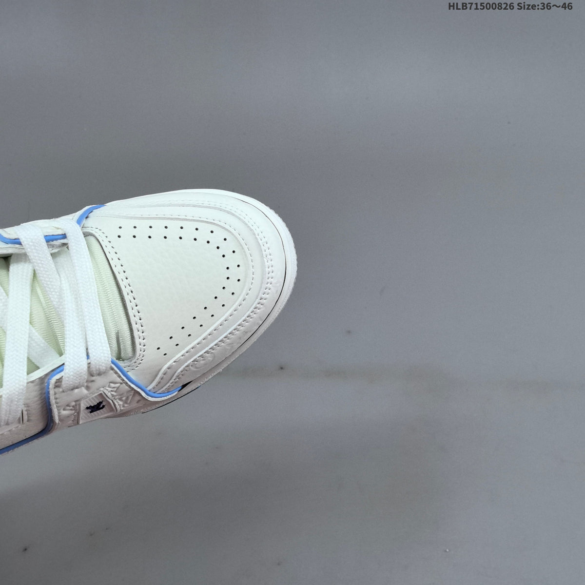 Louis Vuitton White Low-Cut Sneakers with Blue Accents - product image from the listing.