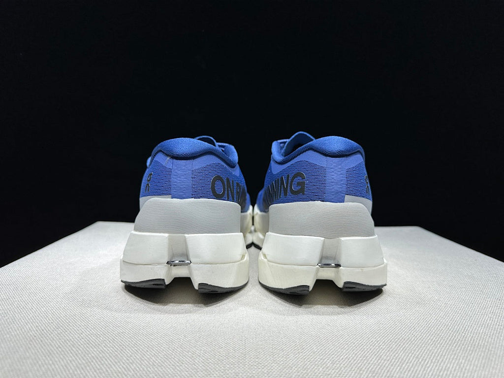 On Cloudboom Max Running Shoes, in Blue and White - product image from the listing.