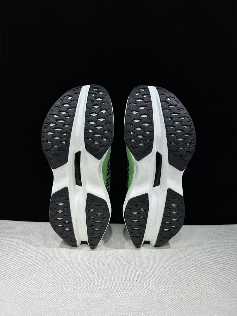 On Cloudboom Max Running Shoes, in White and Green - product image from the listing.