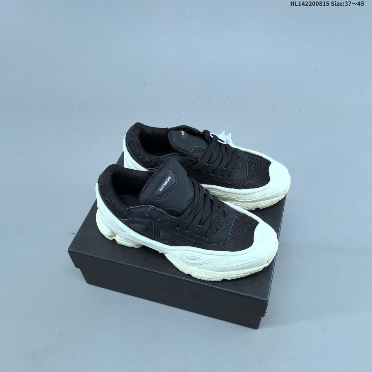Raf Simons x adidas Ozweego III Retro Sneakers for Running - product image from the listing.