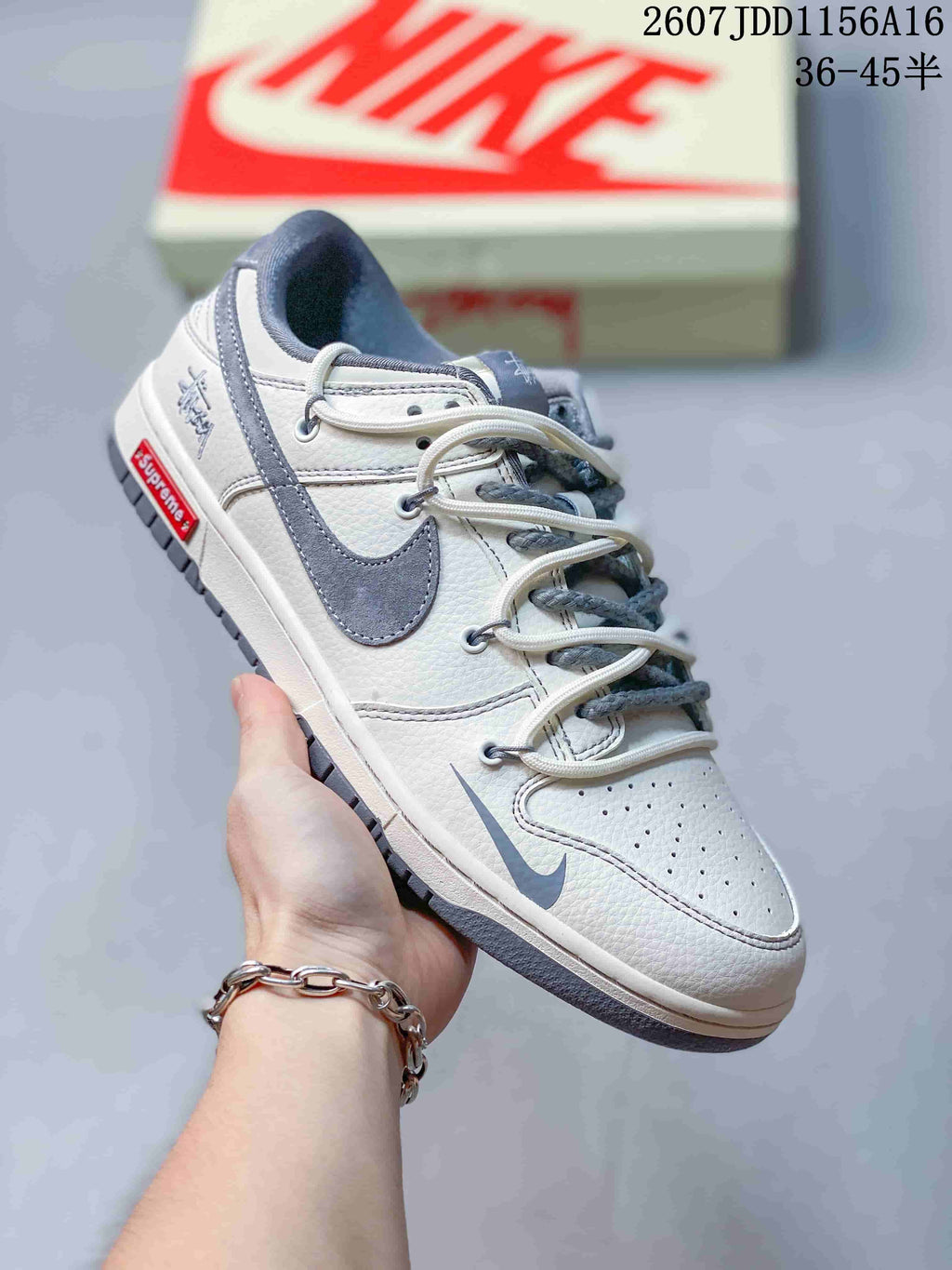 Nike SB Dunk Low Supreme-Style Sneakers in White Grey - product image from the listing.