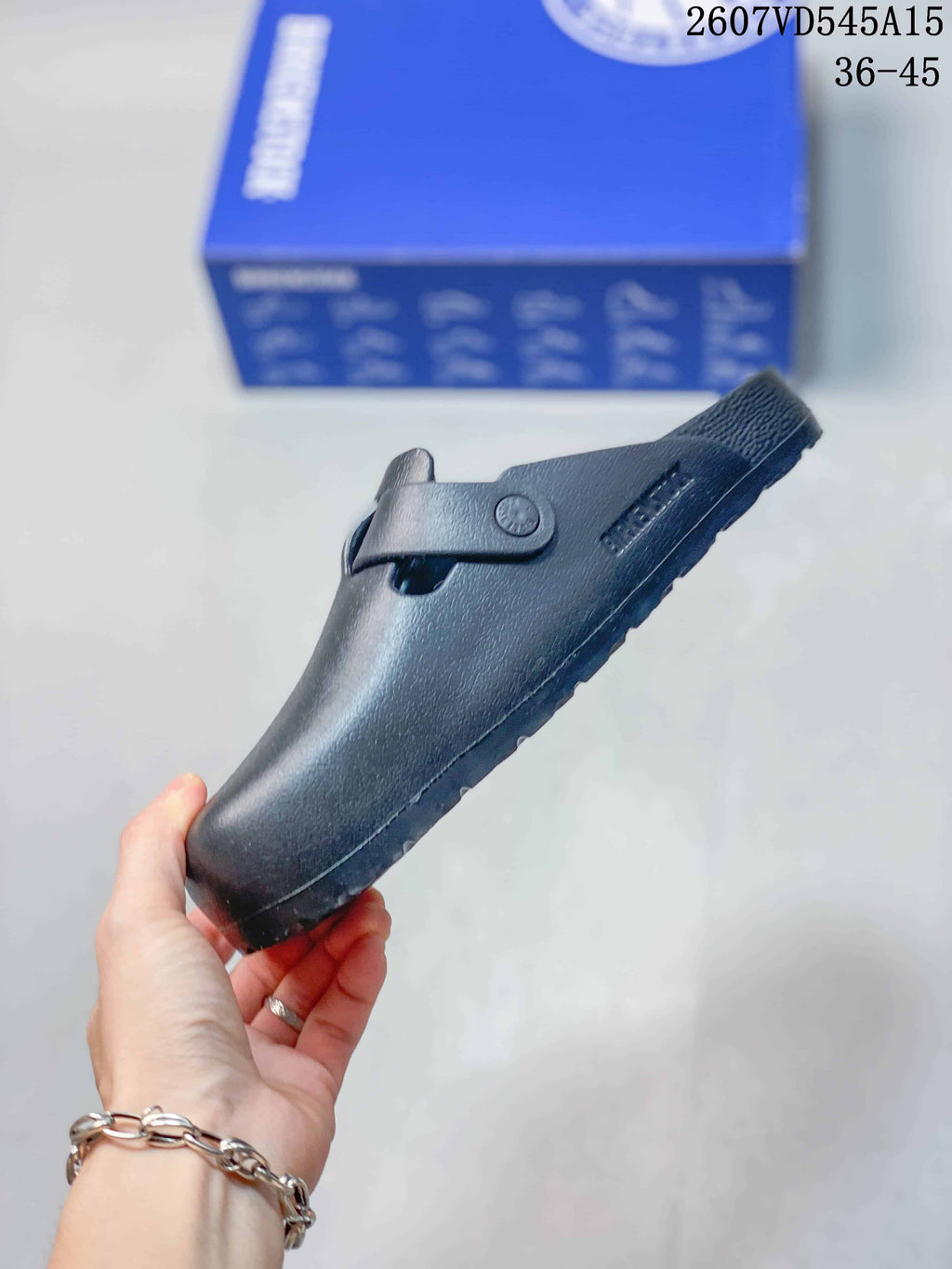 Birkenstock Madrid Big Buckle EVA Clog Sandals in Black - product image from the listing.
