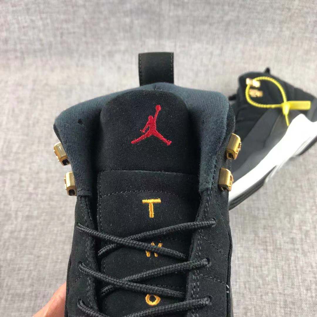 Air Jordan 12 Black Gold Sneakers 130690-017 - product image from the listing.