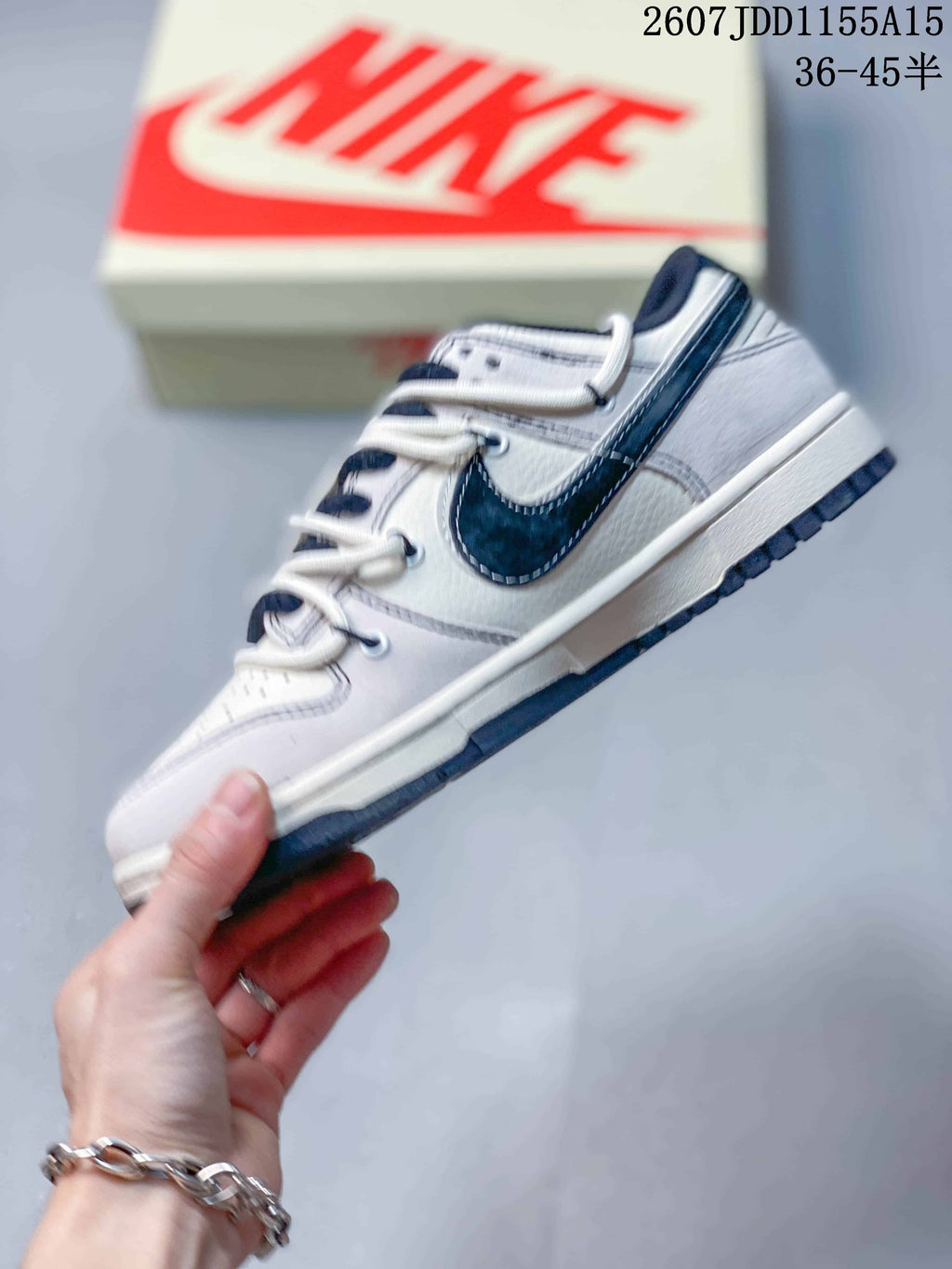 Nike SB Dunk Low Sneakers in Gray White Navy - product image from the listing.