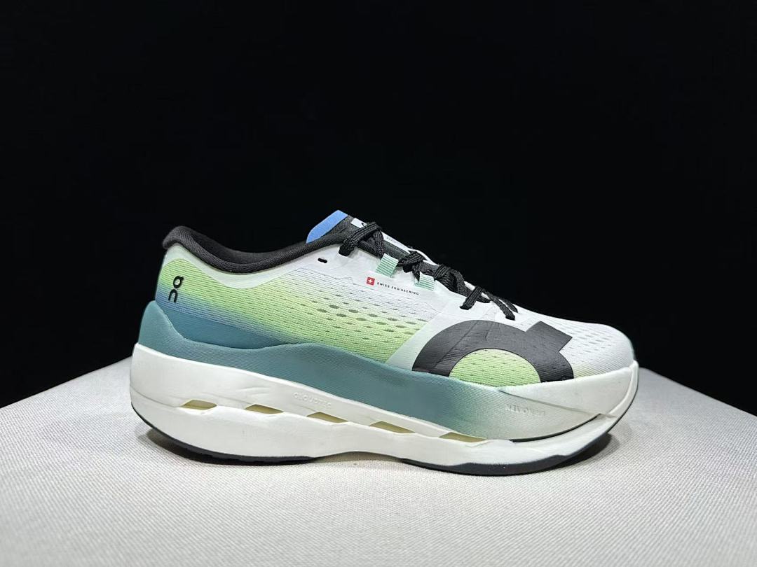 On Cloudboom Max Running Shoes, in White and Green - product image from the listing.