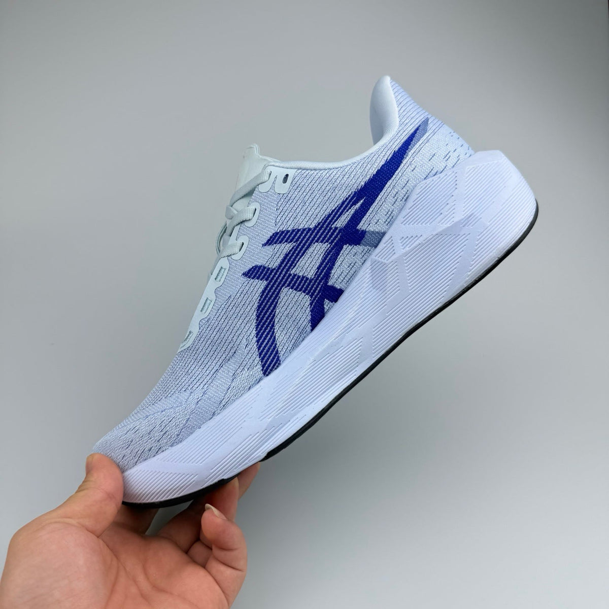 White and Blue ASICS N10 Running Shoes - product image from the listing.