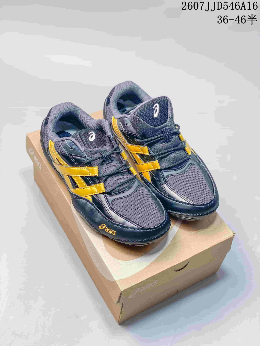 ASICS Hypersync Navy Yellow Retro Trainers 07JJD546A16_003 - product image from the listing.