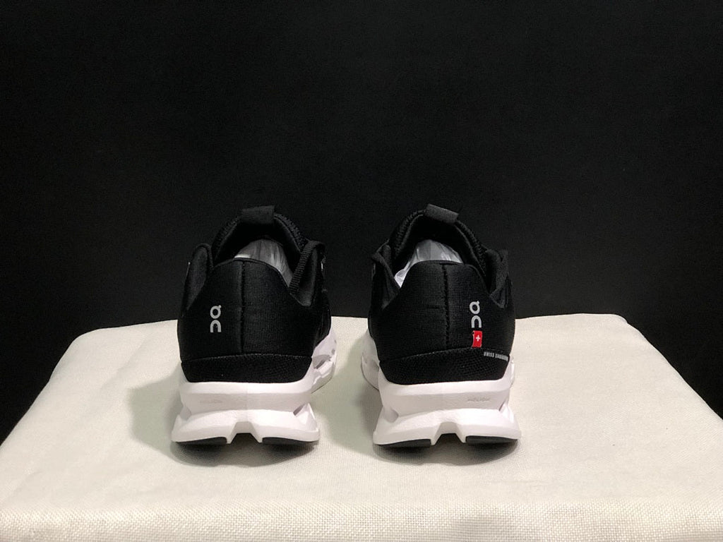 On Cloudsurfer Running Shoes in Black and White - product image from the listing.