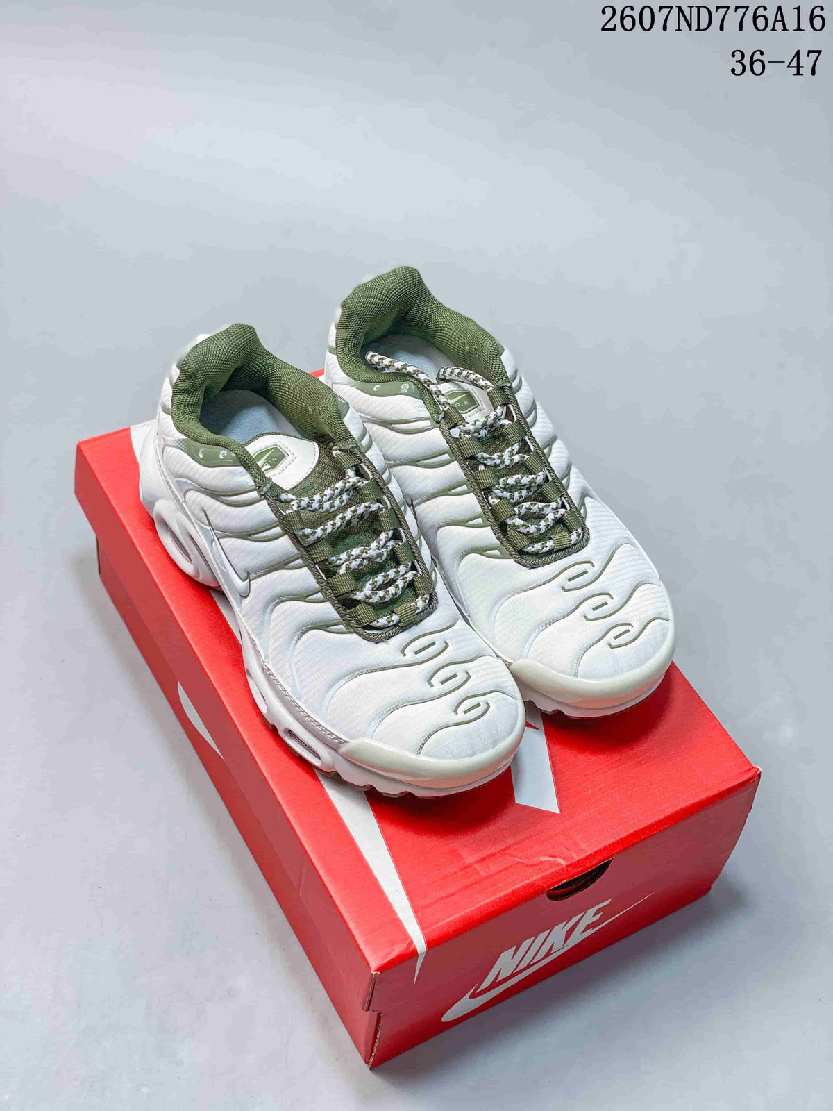 Nike Air Max Plus Sneakers in White and Green 2607ND776A16 - product image from the listing.