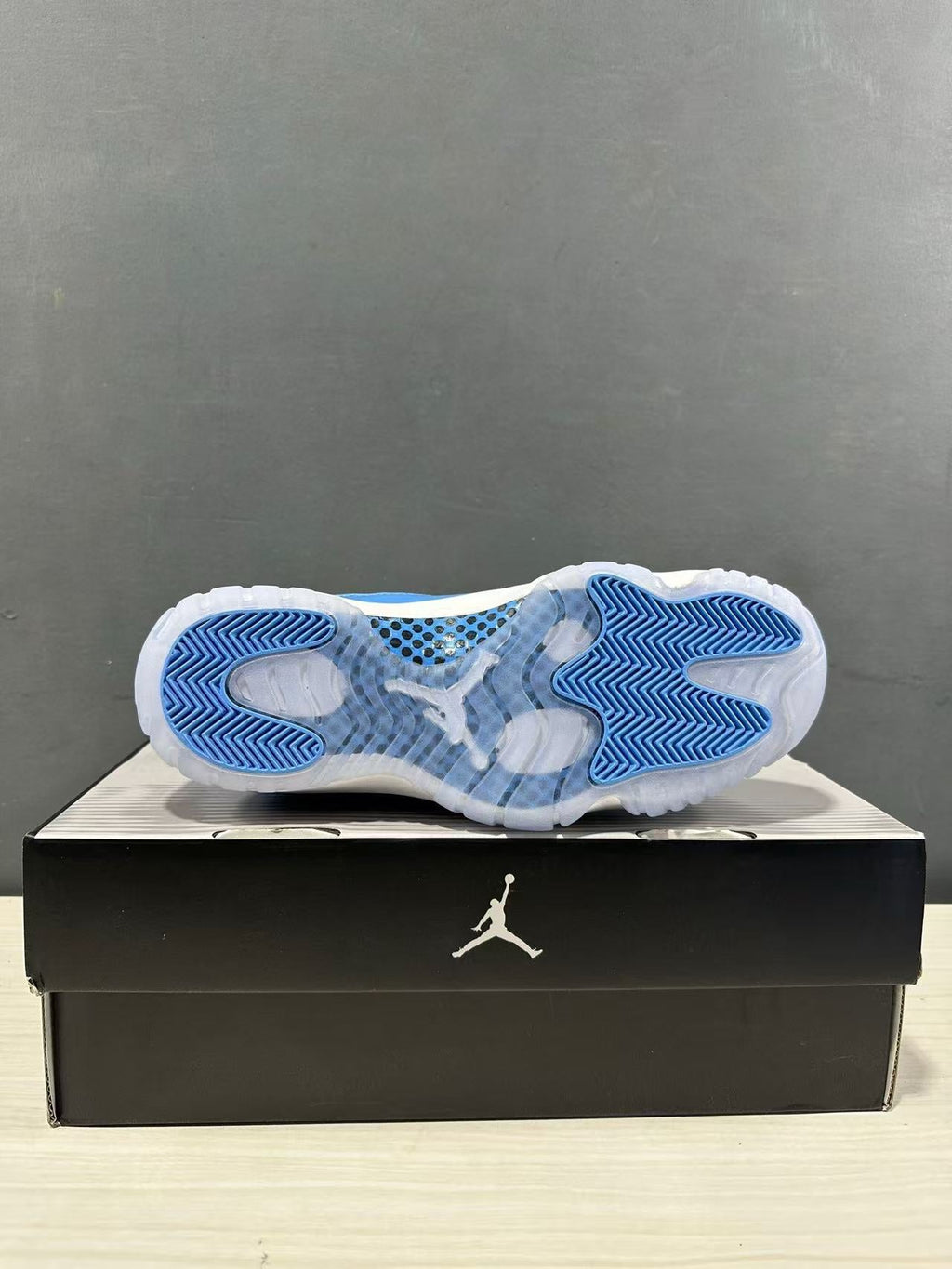 Air Jordan 11 Retro Low UNC Blue Sneakers FV5104-100 - product image from the listing.
