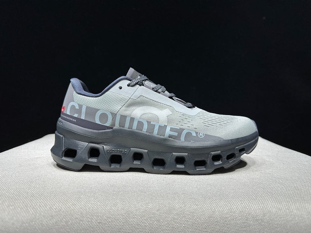 On Cloudmonster Shoes for Running in Eclipse and Magnet - product image from the listing.